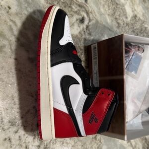 Nike Air Jordan 1 High OG in Black, White, and Red